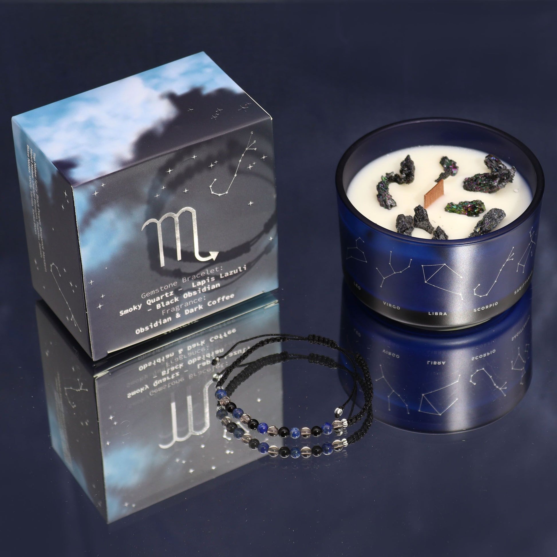 A premium dark-themed candle tin featuring Scorpio zodiac illustrations, shown alongside a hidden gemstone bracelet.
