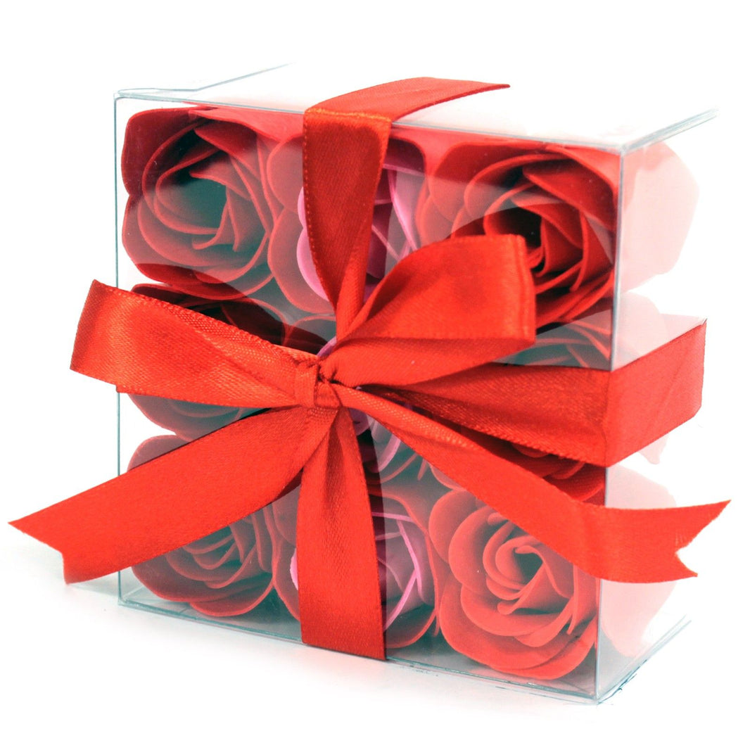 A red square gift box featuring 9 realistic red soap rose flowers arranged in a classic and romantic floral display.