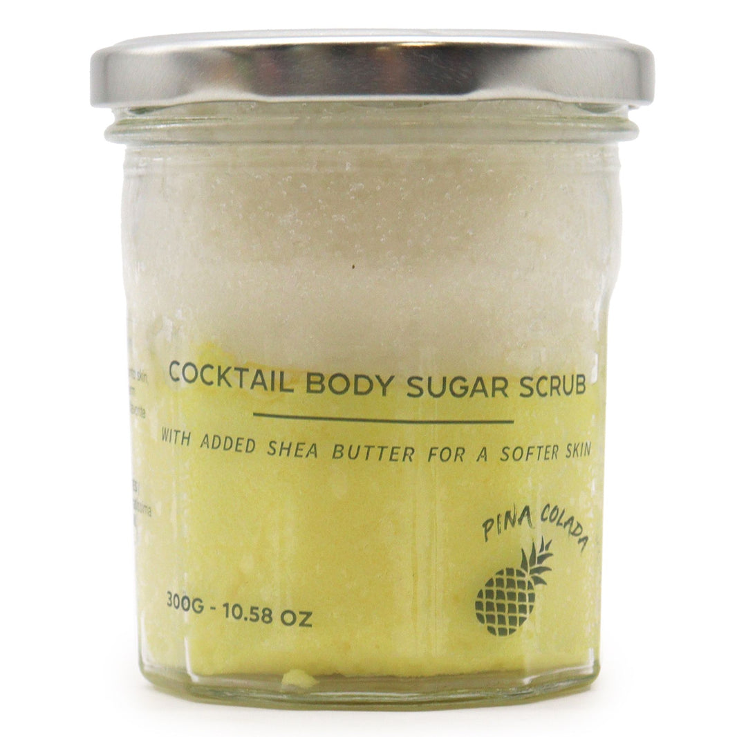A 300g jar of creamy yellow sugar body scrub featuring a tropical pineapple and coconut fragrance.