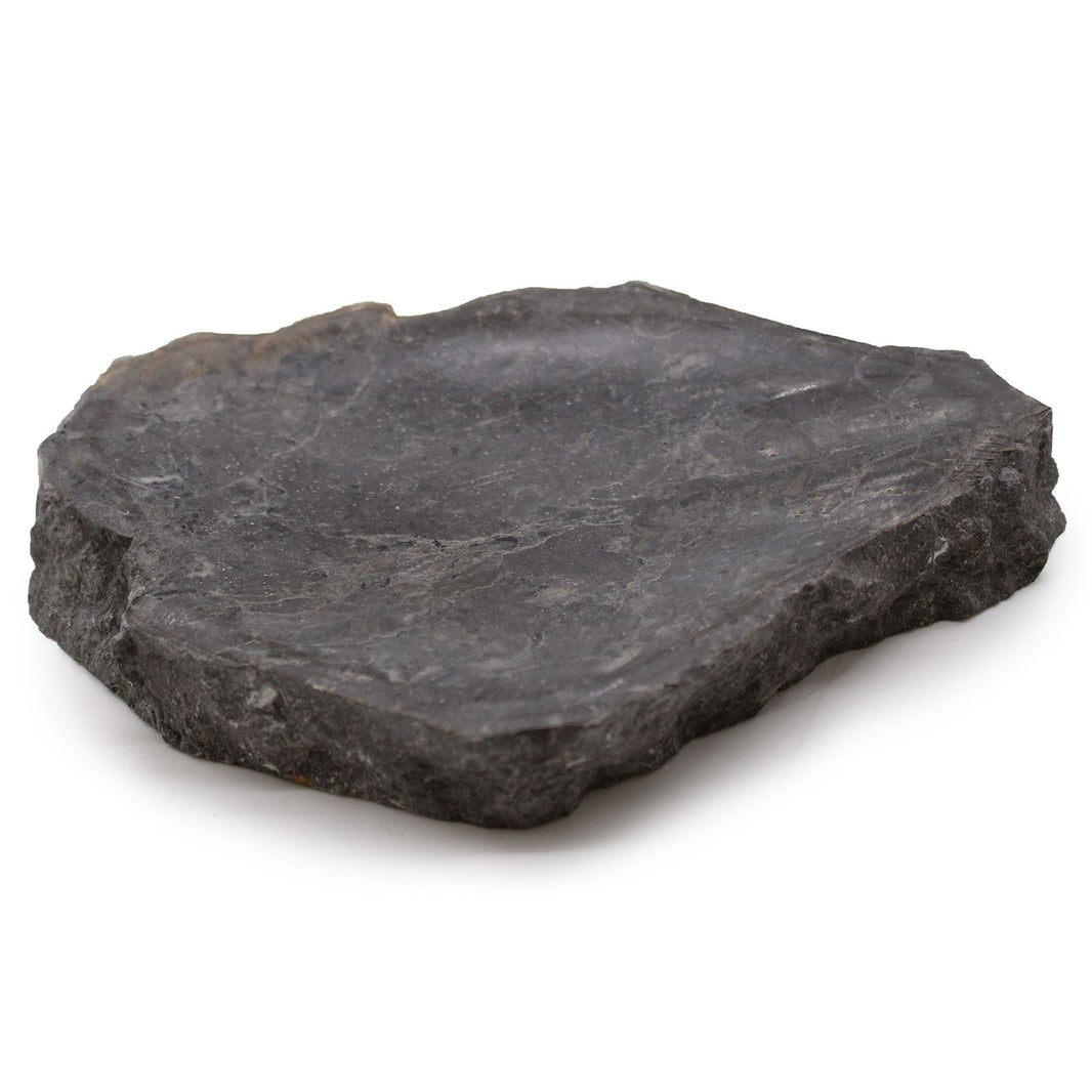 A heavy, rectangular soap dish carved from authentic natural grey marble with organic stone textures.