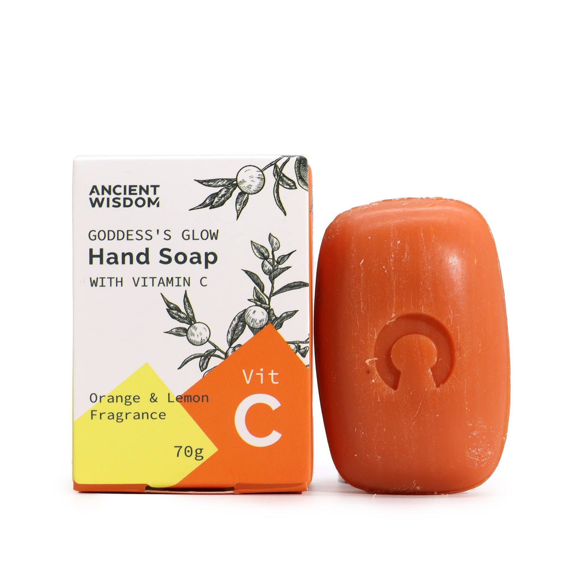 A bright orange, oval-shaped hand soap bar resting next to its white and orange illustrated packaging.