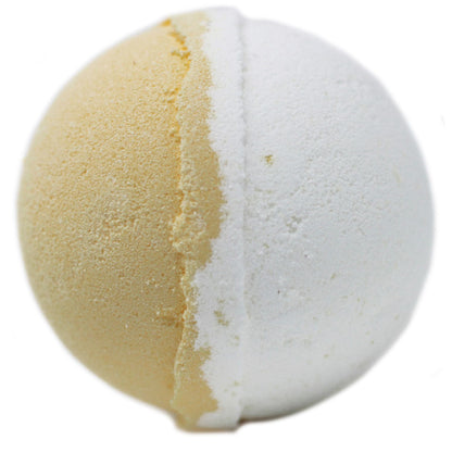 A large, round yellow and white bath bomb inspired by a lemon meringue pie, featuring a zesty citrus fragrance.