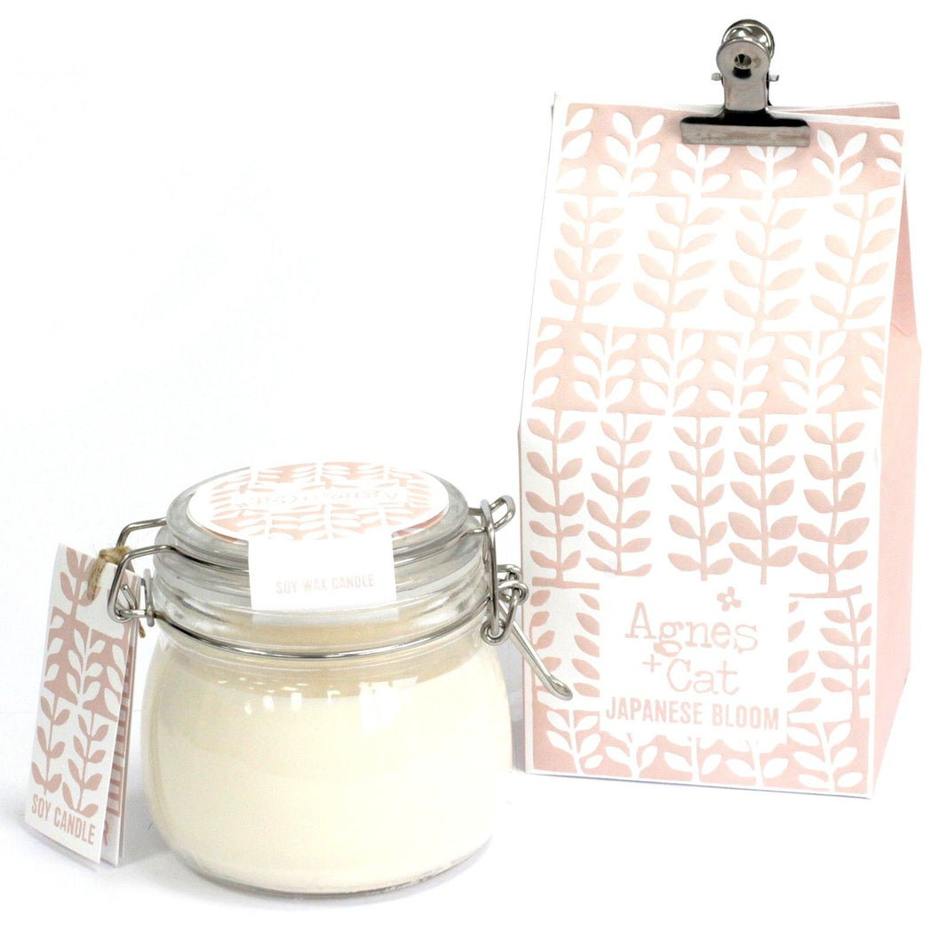 A glass Kilner jar candle filled with cream soy wax scented with Japanese bloom floral blossoms.
