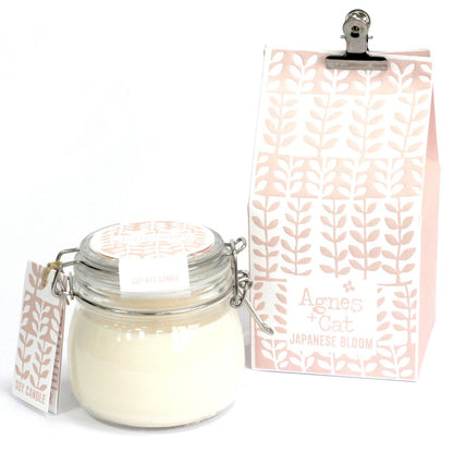 A glass Kilner jar candle filled with cream soy wax scented with Japanese bloom floral blossoms.