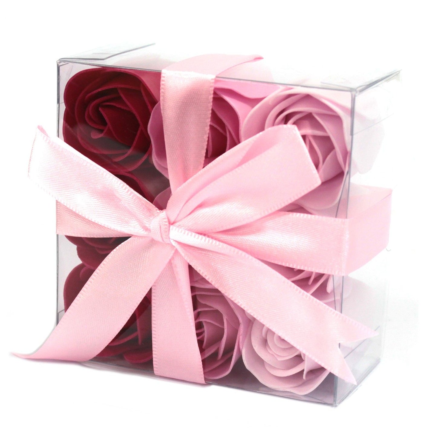 Nine realistic pink soap roses arranged in a square gift box with a pink ribbon.