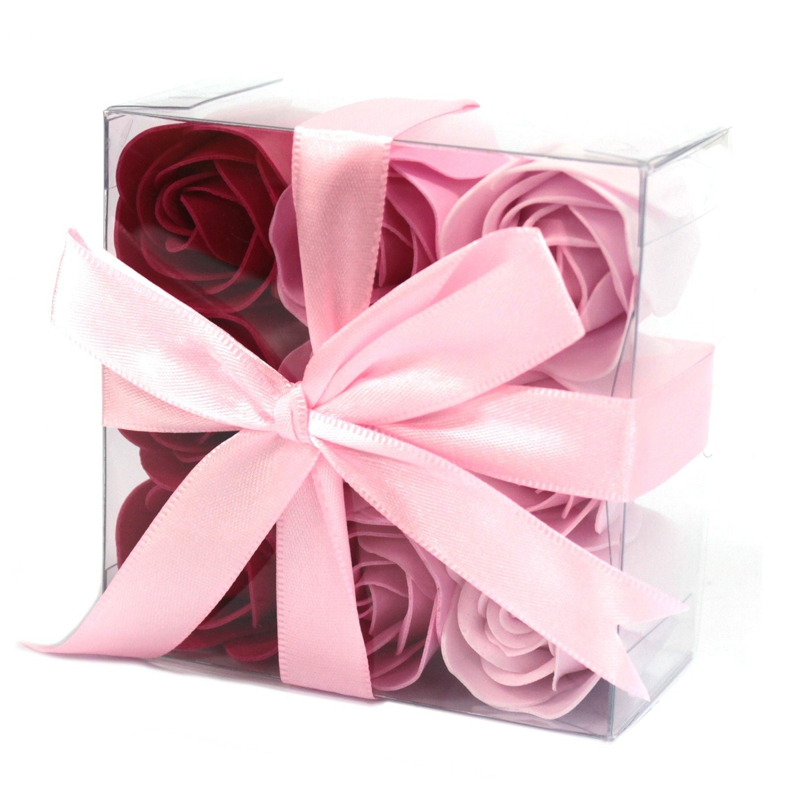 Nine realistic pink soap roses arranged in a square gift box with a pink ribbon.