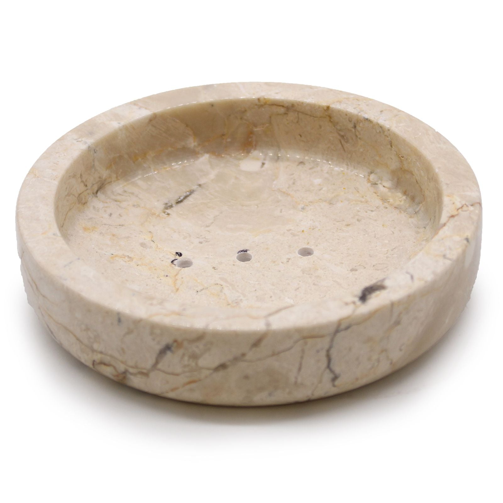 A flat, circular soap dish carved from polished natural honey-toned marble with elegant stone veining.