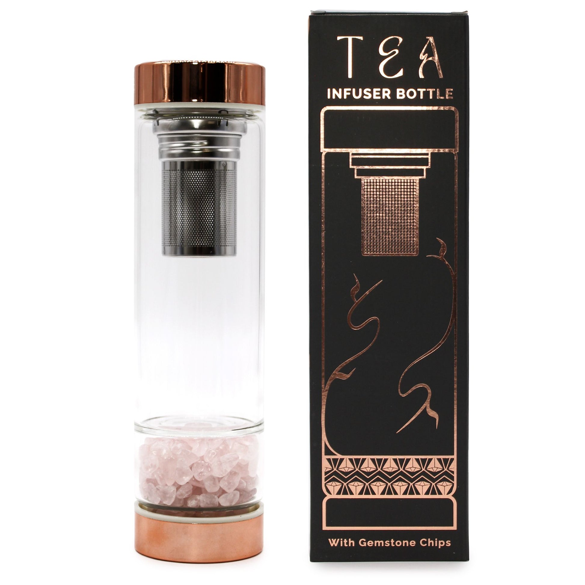 A glass travel tea bottle with rose gold metal caps and a separate compartment containing raw pink rose quartz gemstones.