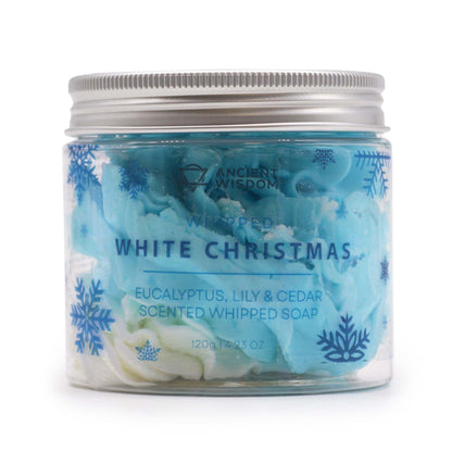 A 120g clear jar of white whipped cream soap with blue accents and a festive holiday-themed label.