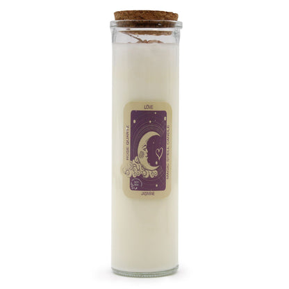 A white ritual pillar candle with a soft pink 'Love' label decorated with romantic botanical and mystical art.