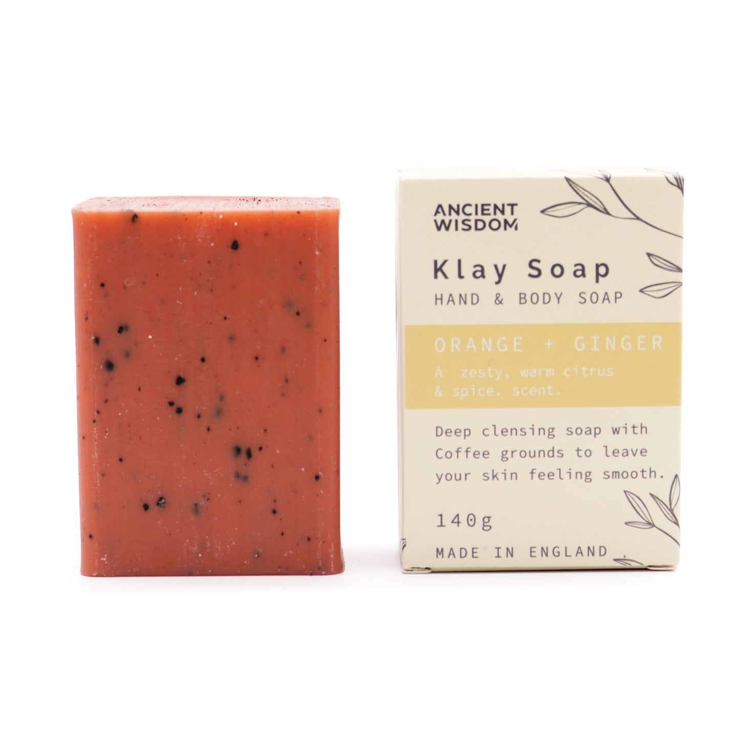 A handcrafted clay-based soap bar in a terracotta tone, featuring a refreshing orange and ginger fragrance.