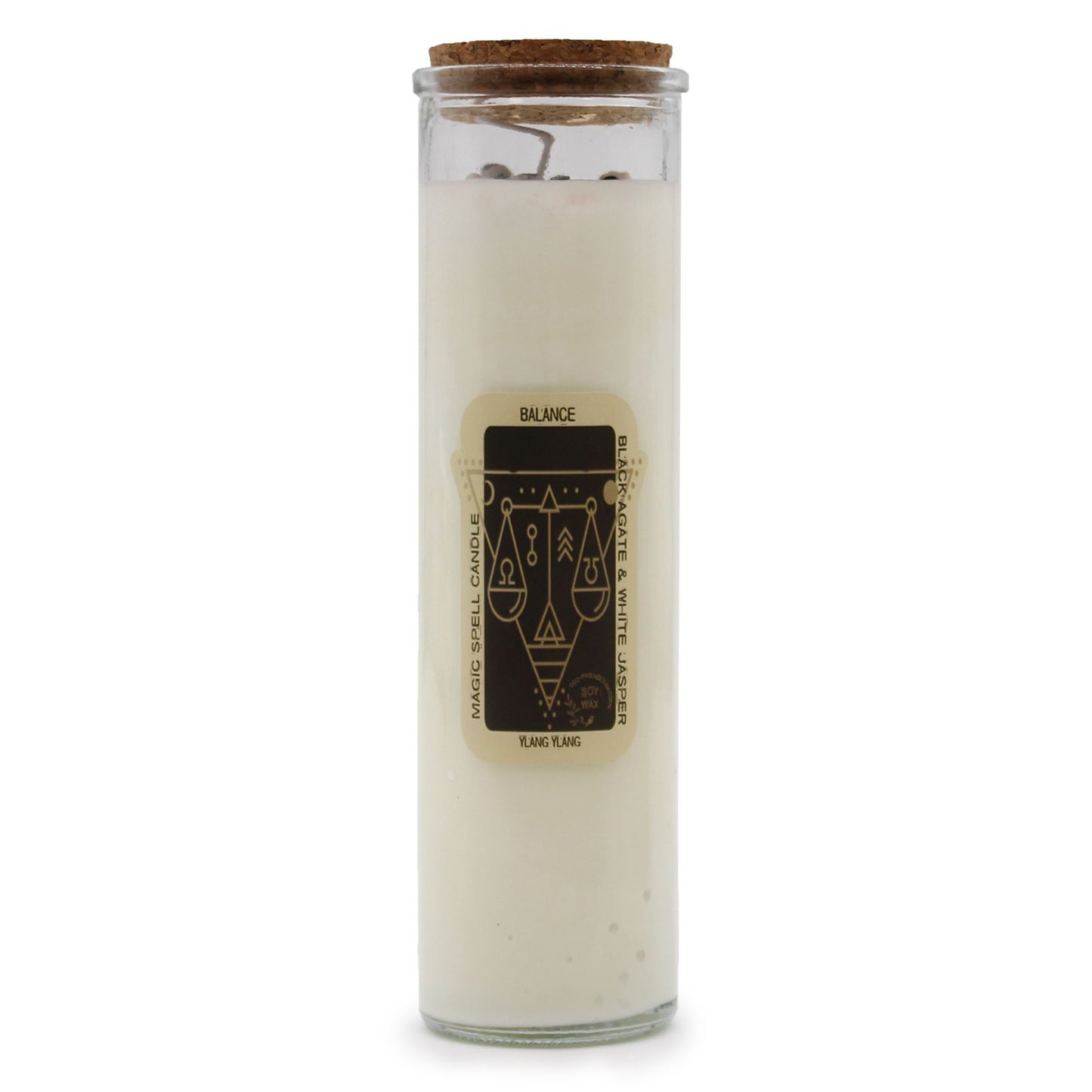 A tall, white magic spell candle wrapped in paper featuring mystical symbols and the word "Balance" in a decorative font.