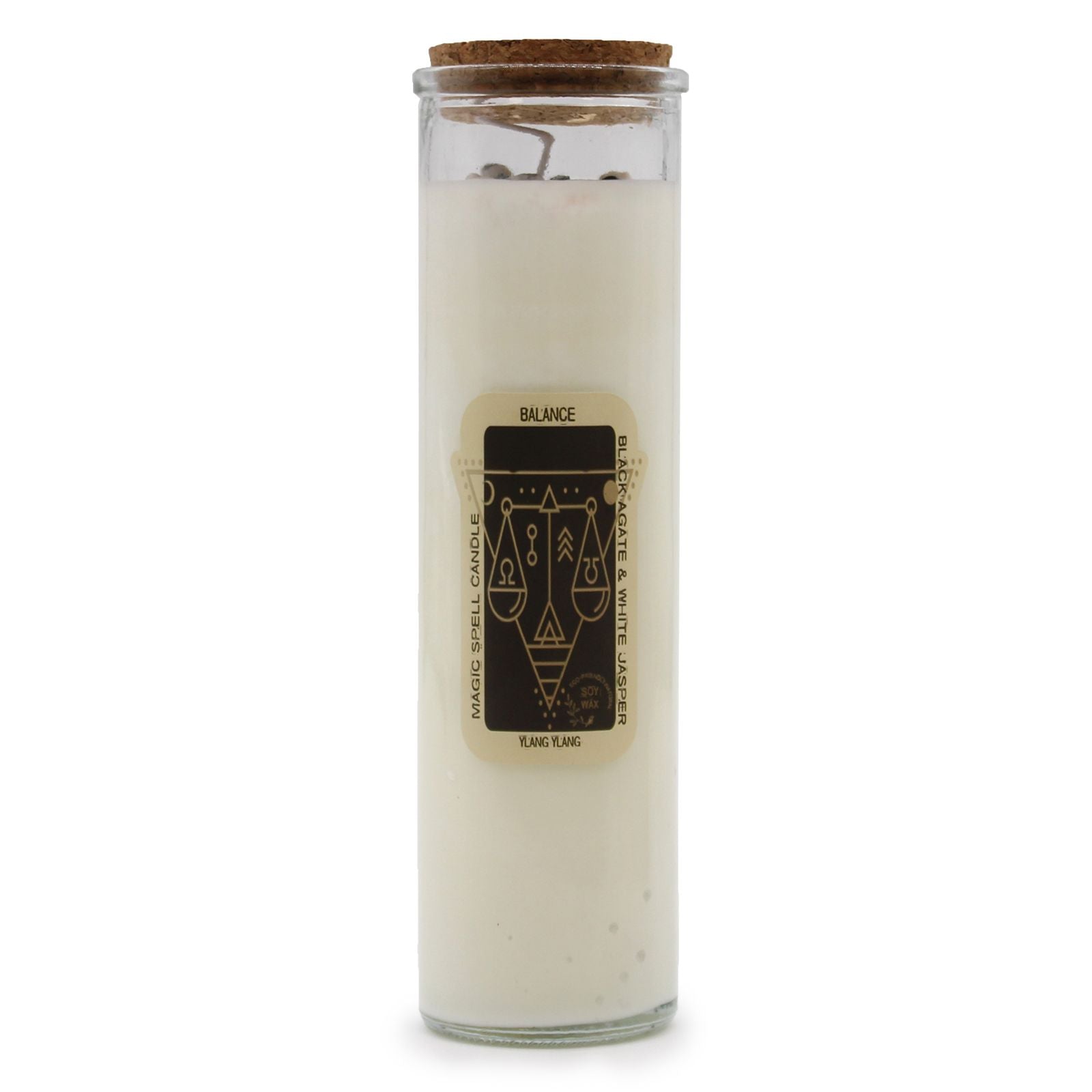 A tall, white magic spell candle wrapped in paper featuring mystical symbols and the word "Balance" in a decorative font.