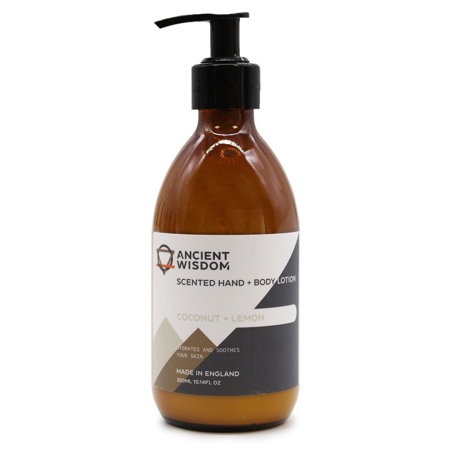 An elegant amber glass pump bottle featuring a minimalist black and white label for the coconut and lemon body lotion.
