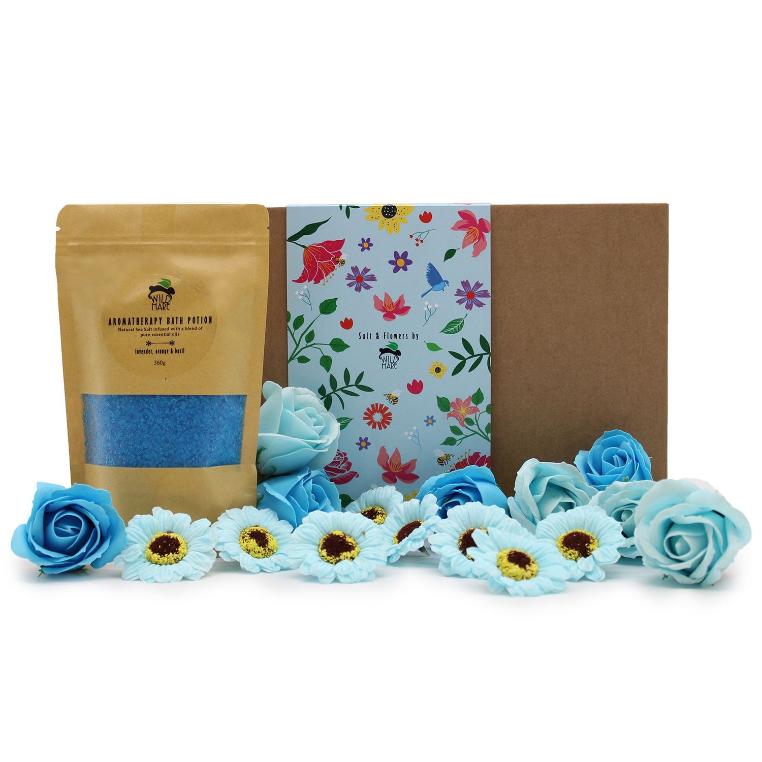 A blue-themed bath gift set featuring Wild Hare bath salts and dried flower botanicals in a display box.