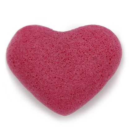 A deep pink, heart-shaped natural Konjac facial sponge designed for gentle skin exfoliation and daily cleansing.
