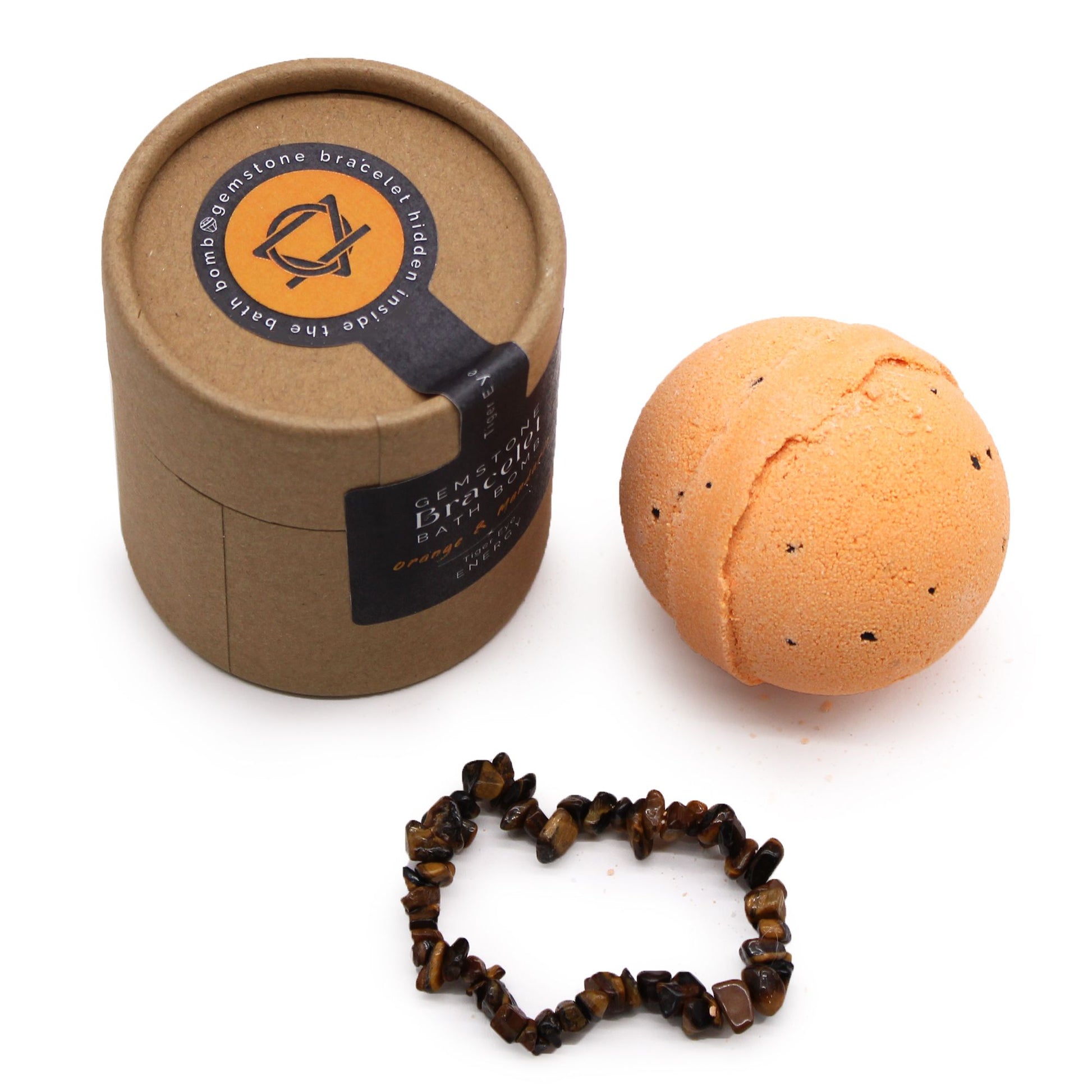 An orange-toned 170g bath bomb with a decorative Tiger Eye gemstone bracelet shown as the hidden surprise inside.