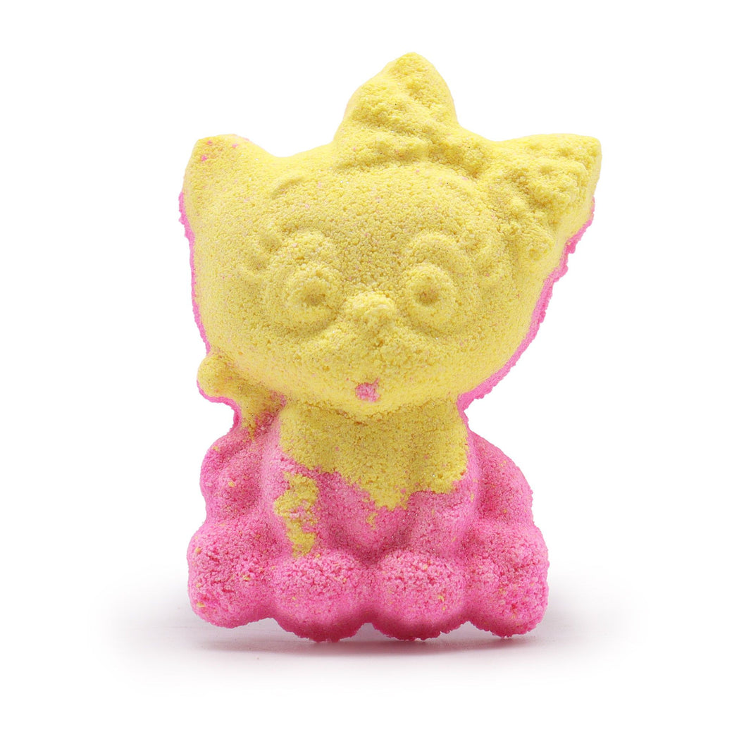 A whimsical, bright yellow bath bomb shaped like a sitting cat with a sweet tropical banana fragrance.