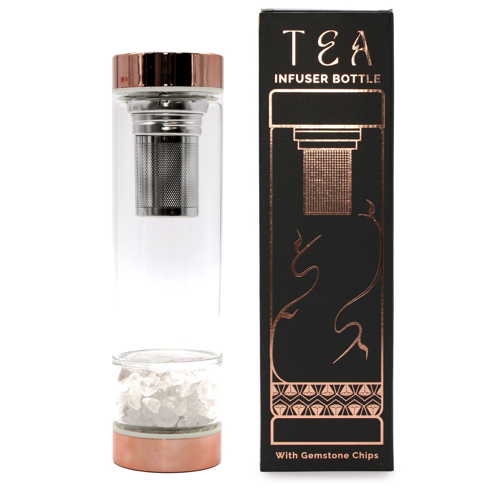 A sleek glass water bottle with a rose gold base and cap containing a large, clear rock quartz crystal point inside the infuser chamber.