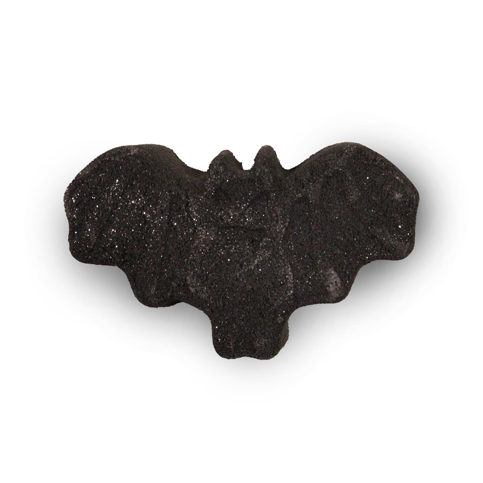 A detailed black bath bomb shaped like a bat with spread wings, perfect for a spooky and atmospheric bath experience.