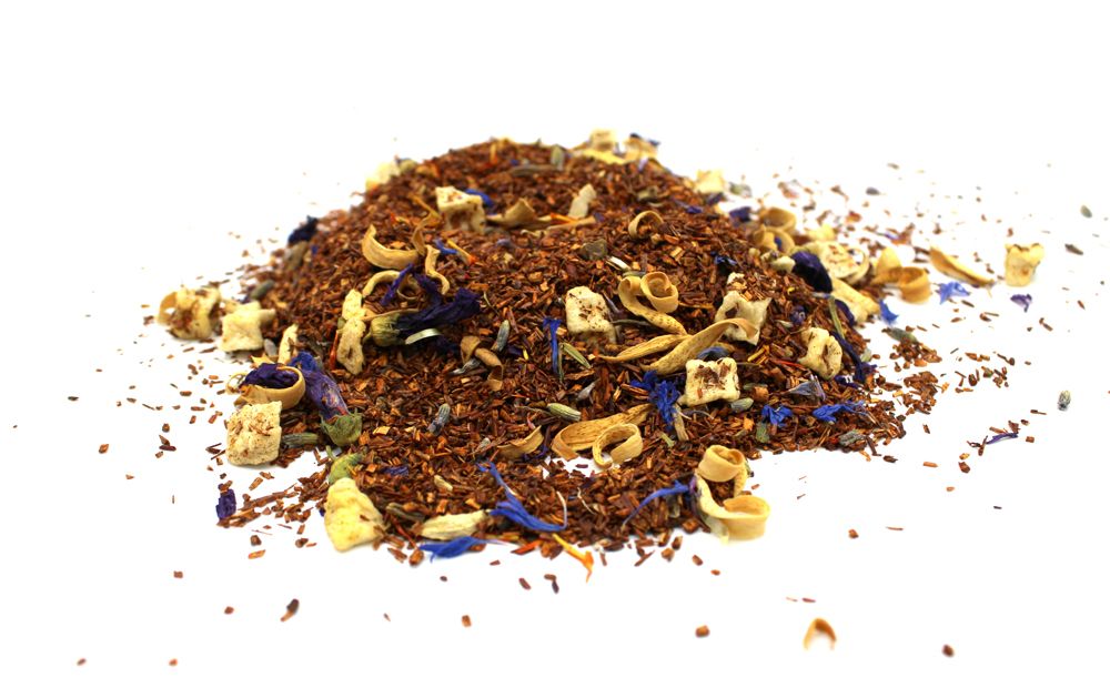 A large bulk quantity of red bush rooibos tea leaves mixed with calming botanicals and flower petals.