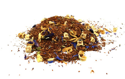 A large bulk quantity of red bush rooibos tea leaves mixed with calming botanicals and flower petals.