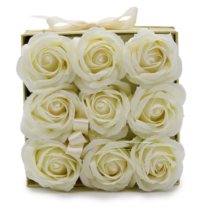 A square white gift box containing 9 realistic cream-colored soap roses, looking like a fresh floral arrangement.