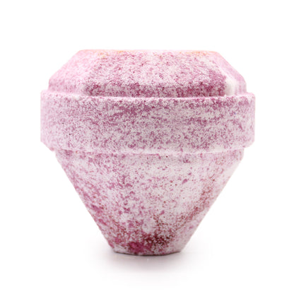 A large 190g pink bath bomb shaped like a giant gemstone, featuring a sweet berry fragrance and hidden surprise.