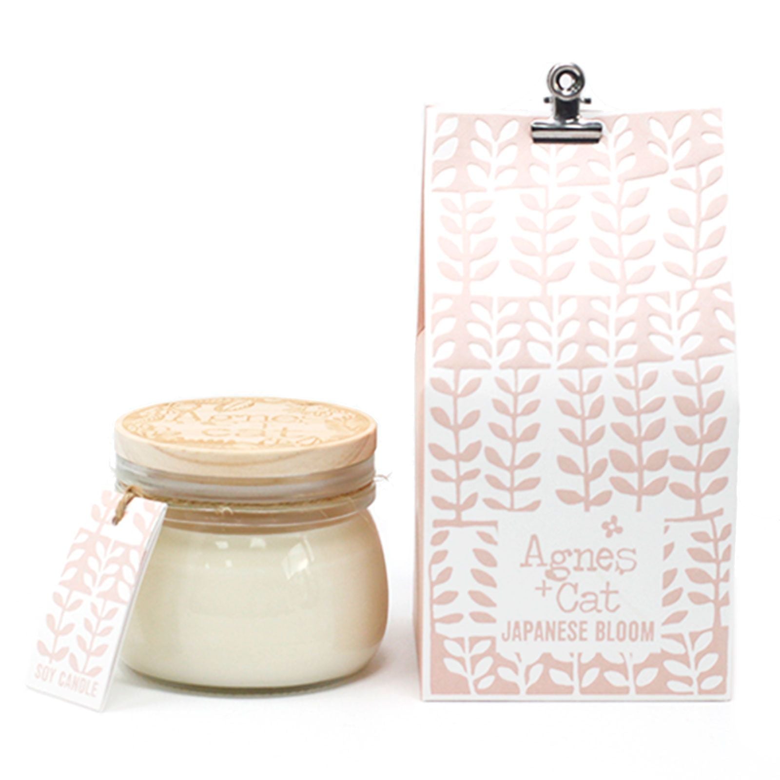 A small reusable glass Kilner jar filled with cream soy wax scented with Japanese floral blossoms.