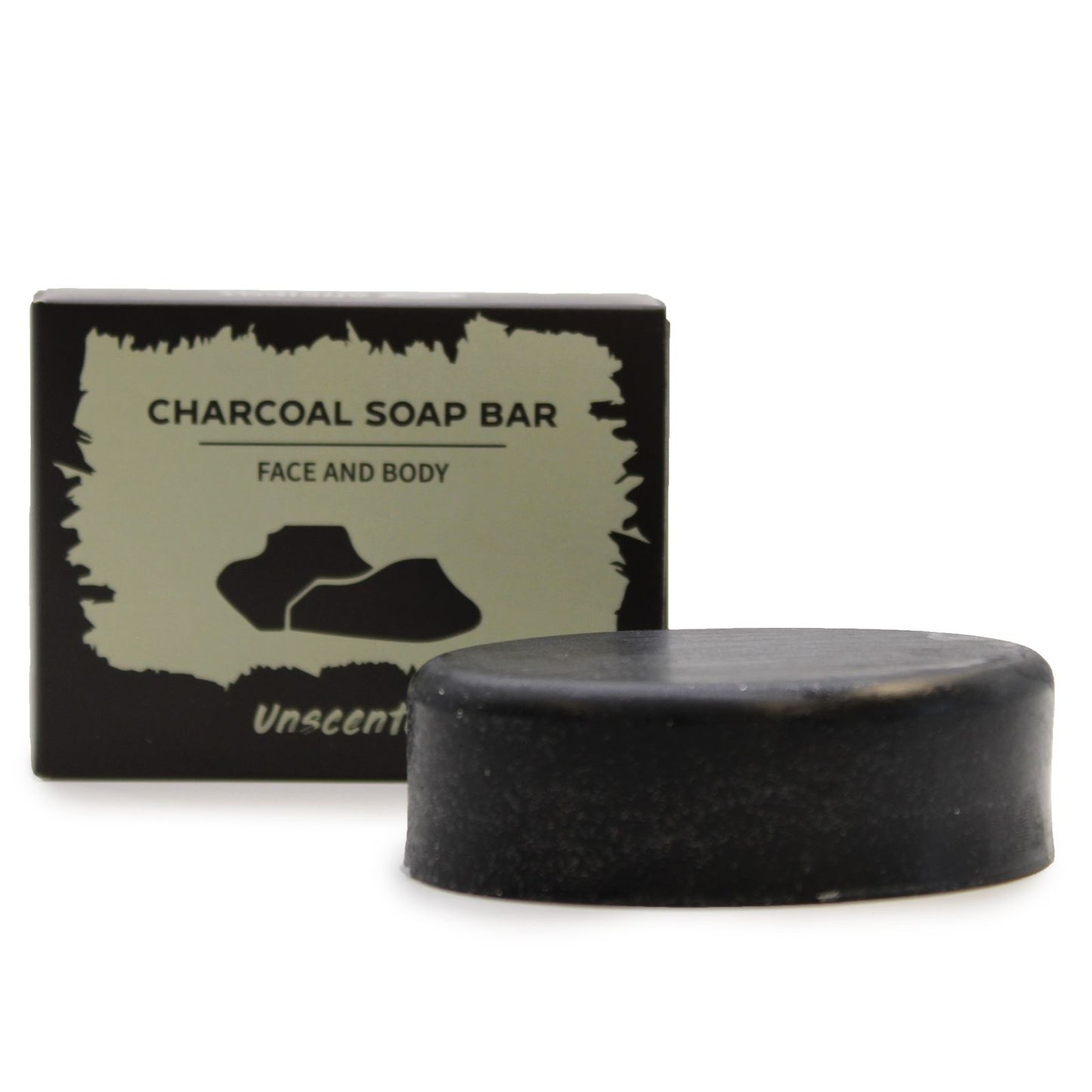 A sleek, jet-black rectangular soap bar packaged in a dark-themed box with minimalist white and grey botanical illustrations.