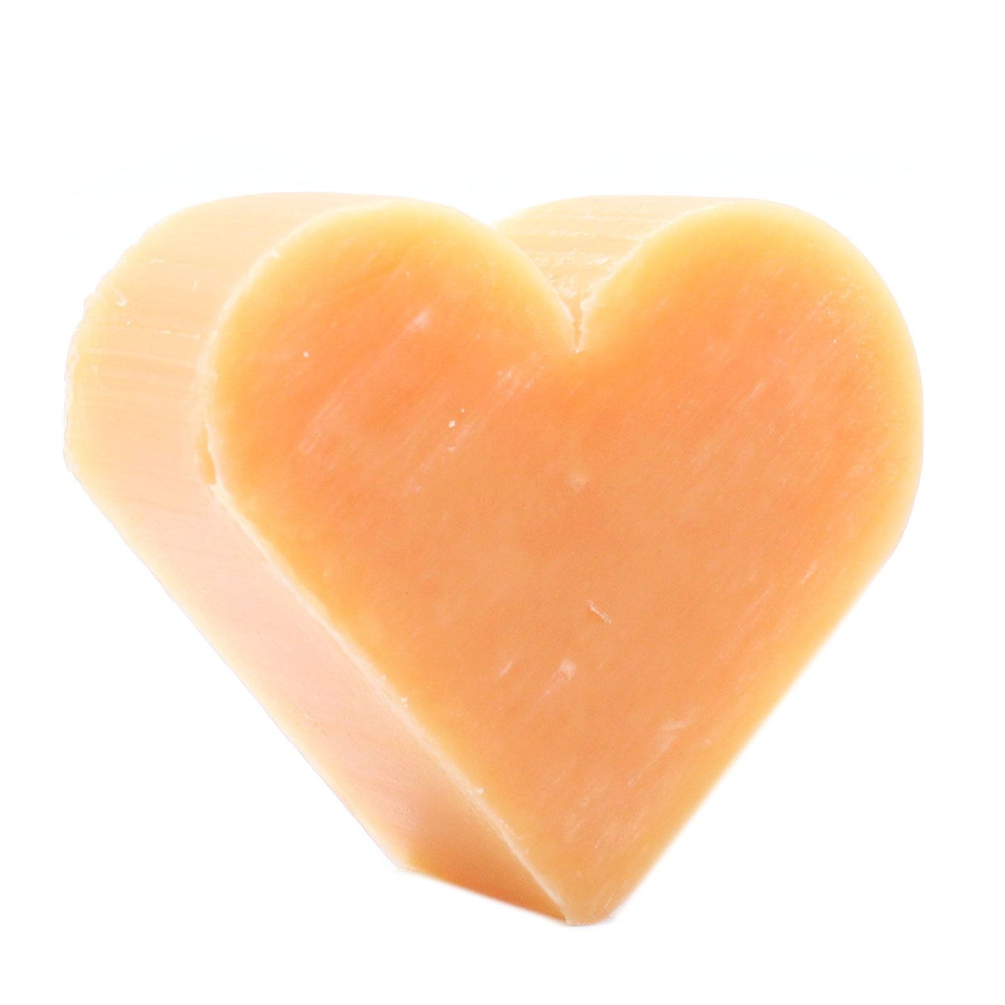 Ten orange heart-shaped mini guest soaps featuring a zesty citrus and warm ginger fragrance.