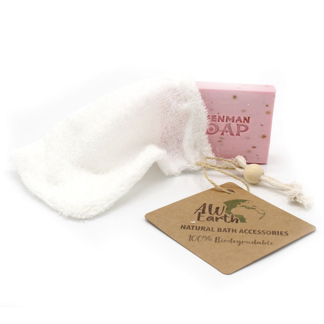 A white natural bamboo fiber soap saver bag with a drawstring, perfect for gentle skin exfoliation and reducing soap waste.