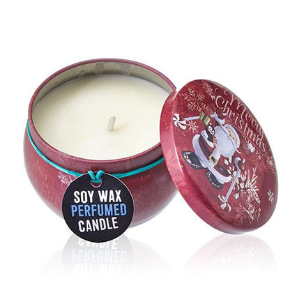 A decorative round metal candle tin with a festive red-and-white illustrated lid showing a retro holiday scene.