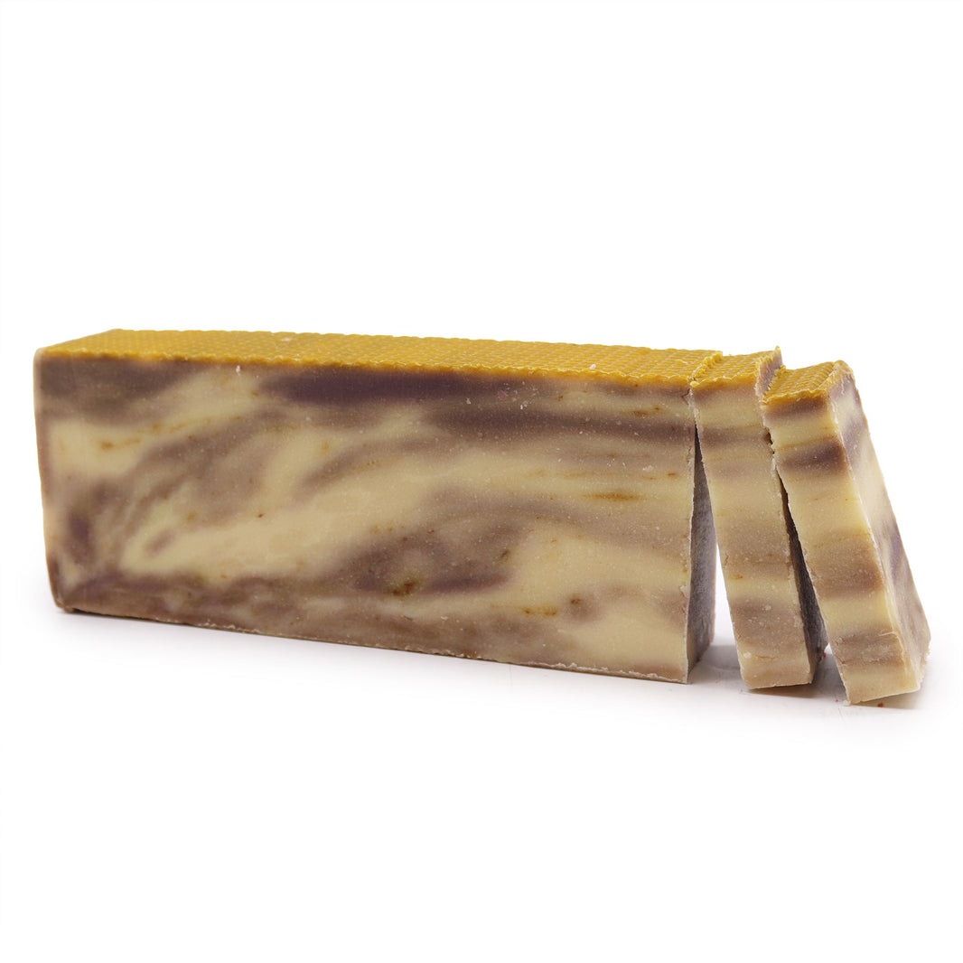A massive 1.25kg artisan soap loaf with earthy gold and brown marbled layers, featuring natural propolis and olive oil.