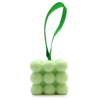 A light green textured massage soap bar with essential oils of Spearmint and Eucalyptus, packaged in a decorative gift box.