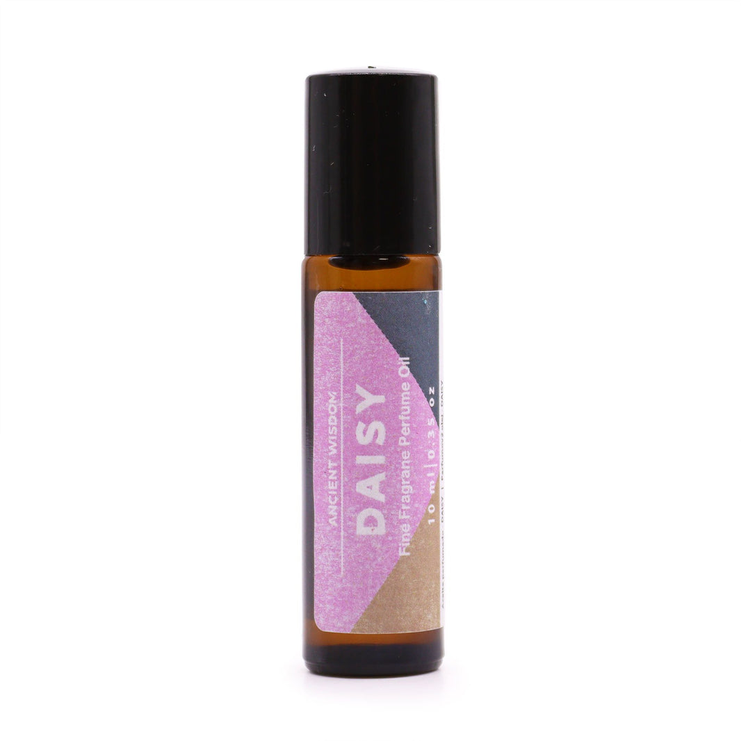 A slim glass perfume rollerball bottle with a purple floral label and a black metallic cap, containing clear fragrance oil.
