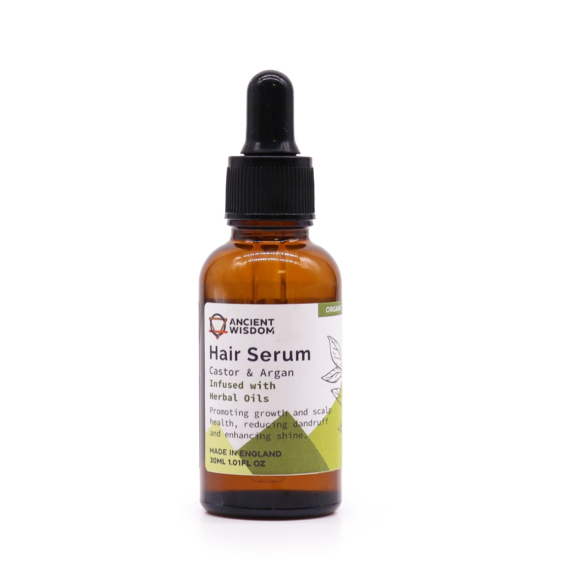 A 30ml amber glass dropper bottle of organic herbal hair serum with a professional minimalist label.