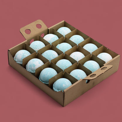 A large cardboard display tray containing sixteen individually wrapped blue and grey bath bombs designed for men.