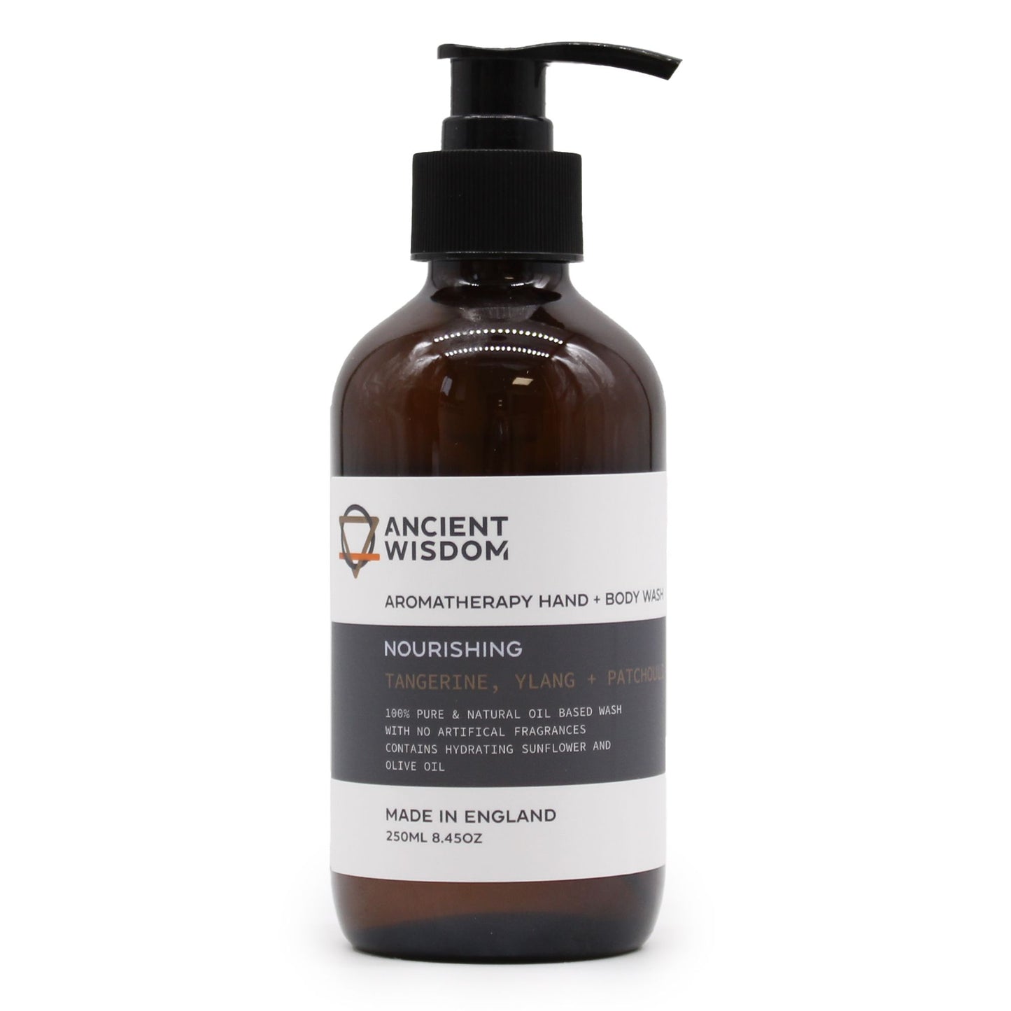 A 250ml amber pump bottle of hand and body wash with a professional apothecary-style label featuring Tangerine and Patchouli essential oils.