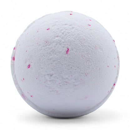 A large, round, grey-toned bath bomb with a smooth finish, offering a high-end take on the classic coconut scent.