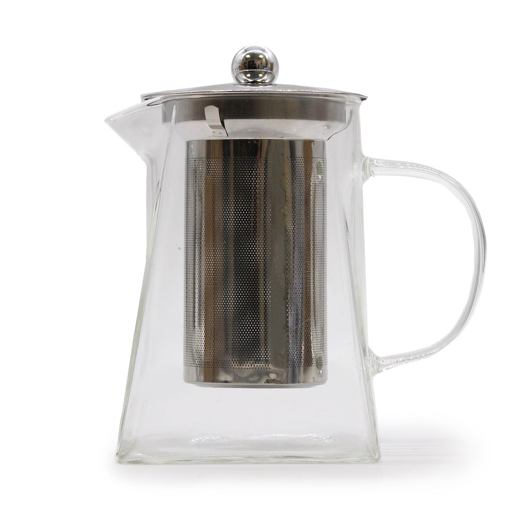 A tall glass teapot with a modern square-profile handle and a fine metal tea filter inside.