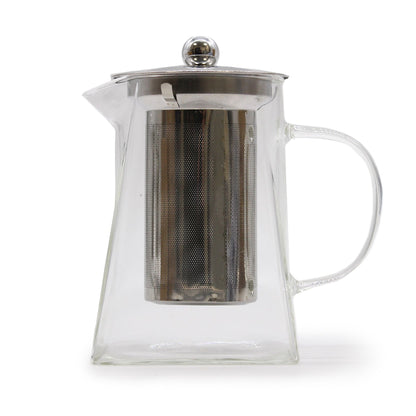 A tall glass teapot with a modern square-profile handle and a fine metal tea filter inside.