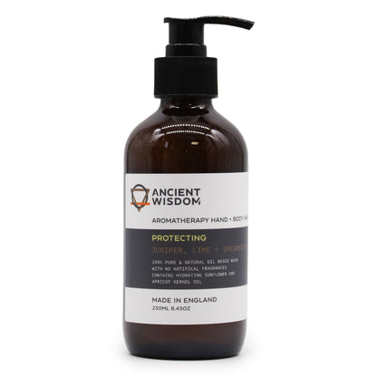 A 250ml amber pump bottle of Juniper, Lime, and Spearmint body wash featuring a professional apothecary-style label.