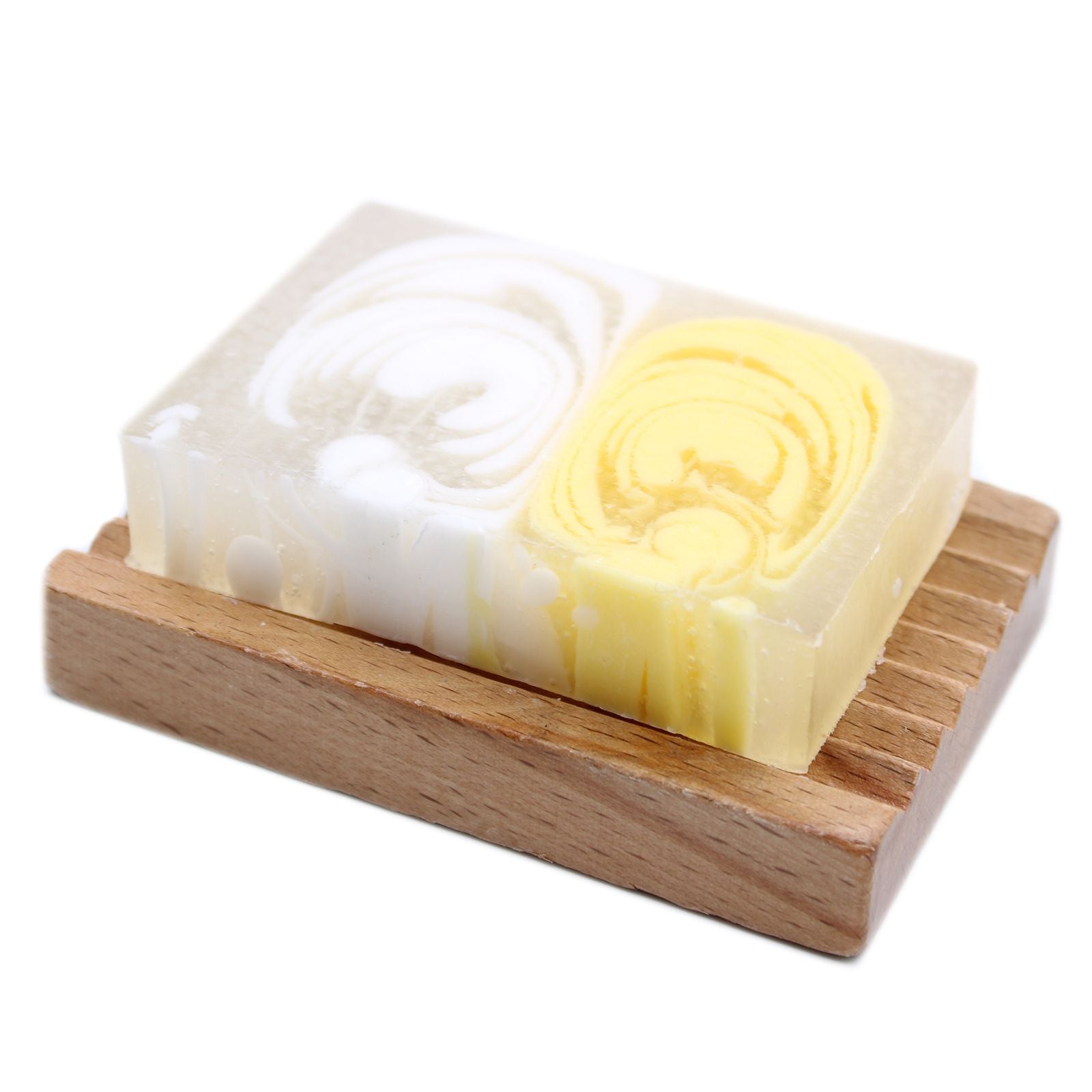 A 115g artisan soap slice featuring cream and white swirls with a warm, sweet vanilla bean fragrance.
