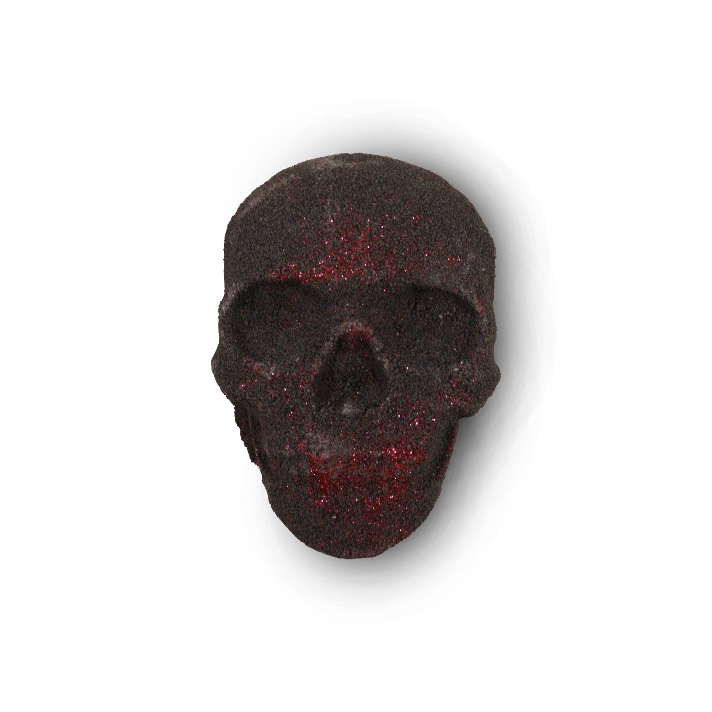 A small 40g dark-toned bath bomb shaped like a human skull, perfect for gothic or alternative gift sets.