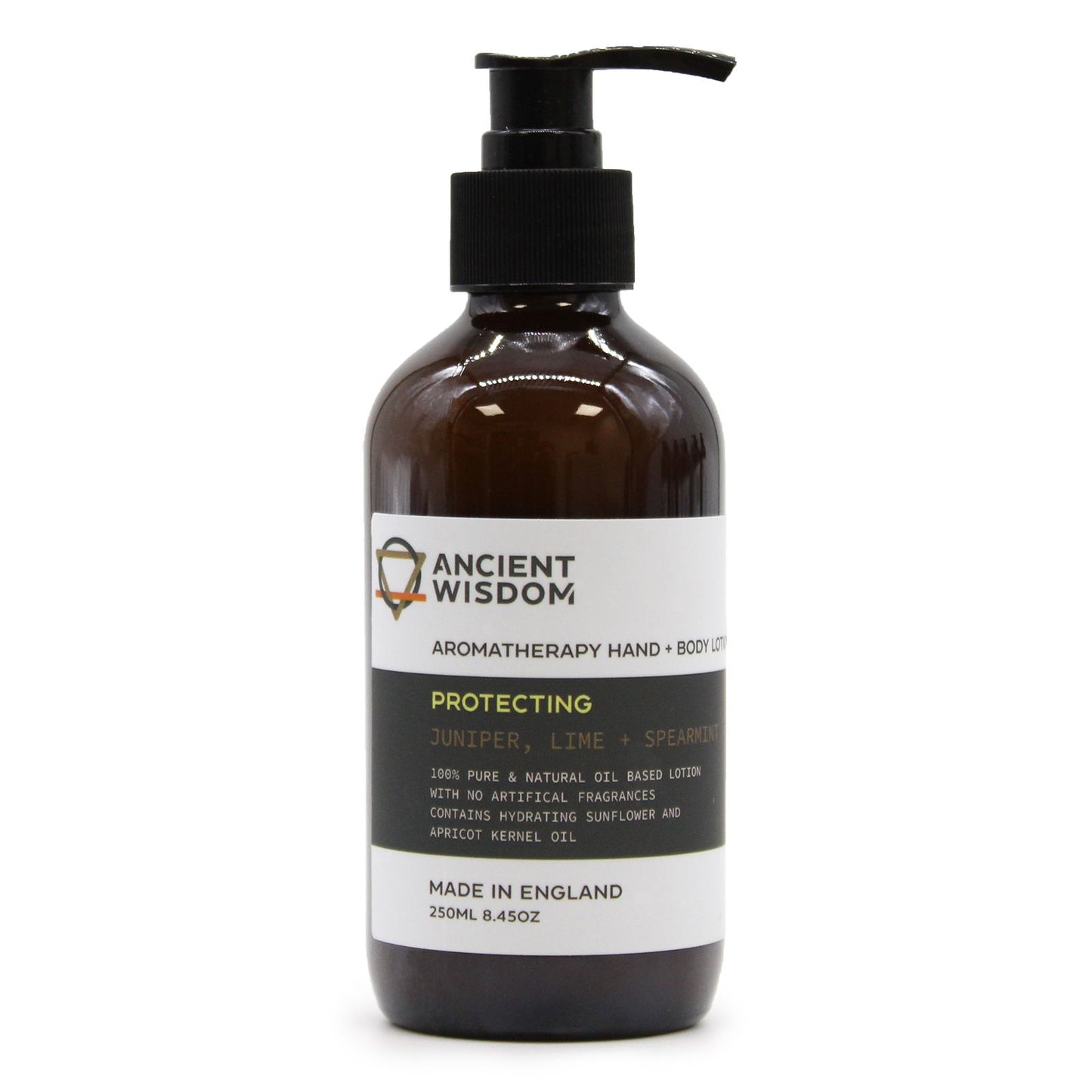 An amber pump bottle of Juniper, Lime, and Spearmint body lotion with a professional apothecary-style label.