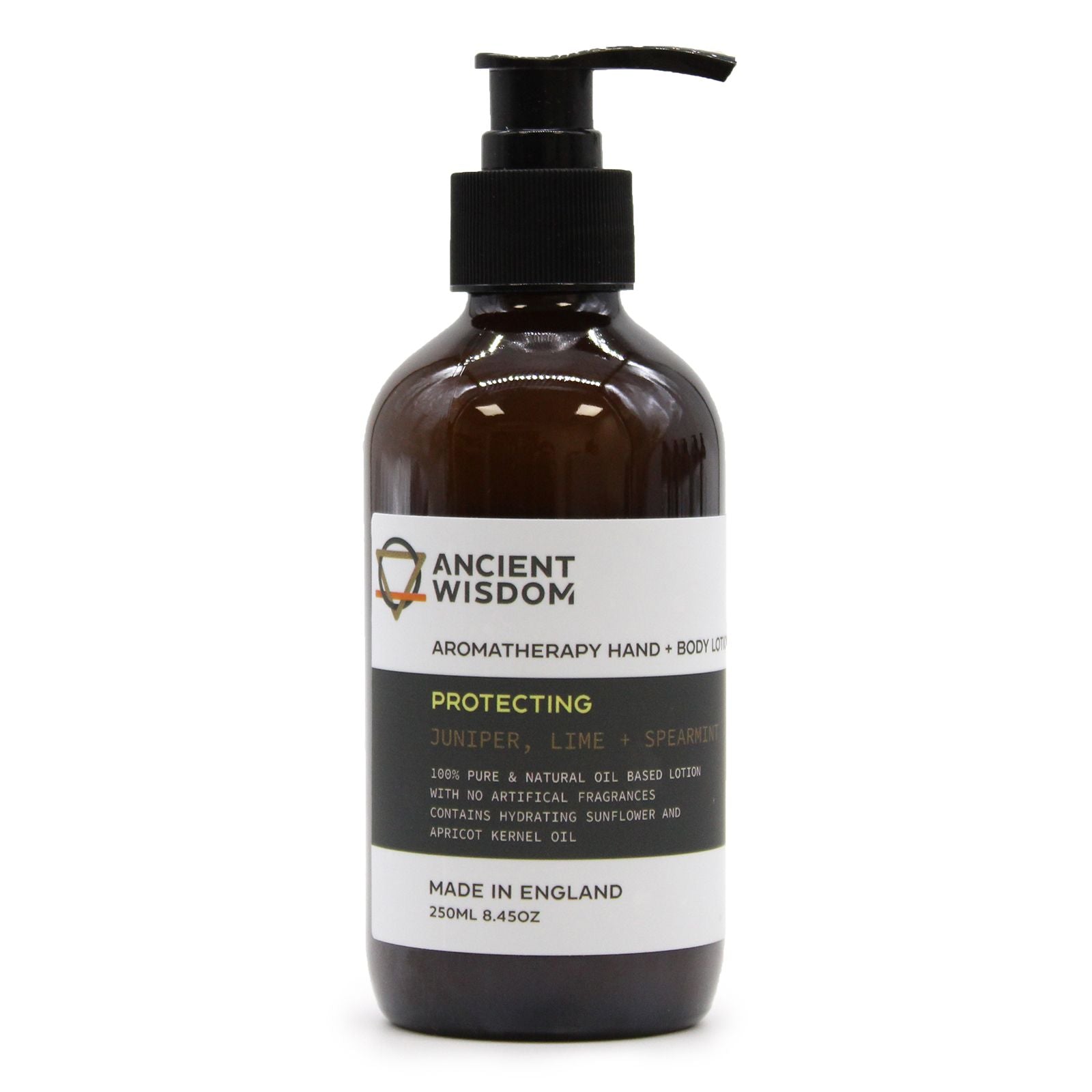 An amber pump bottle of Juniper, Lime, and Spearmint body lotion with a professional apothecary-style label.