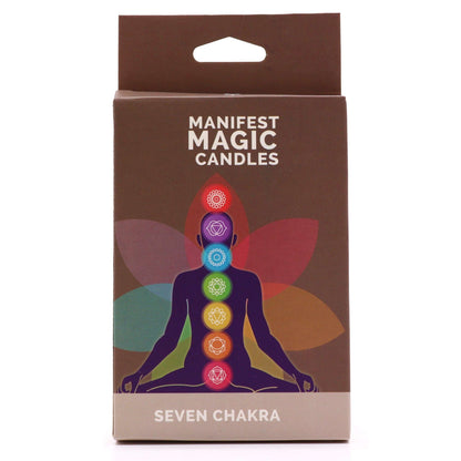 A slim gift box containing seven individual ritual candles in vibrant rainbow colors, labeled for each chakra energy center.