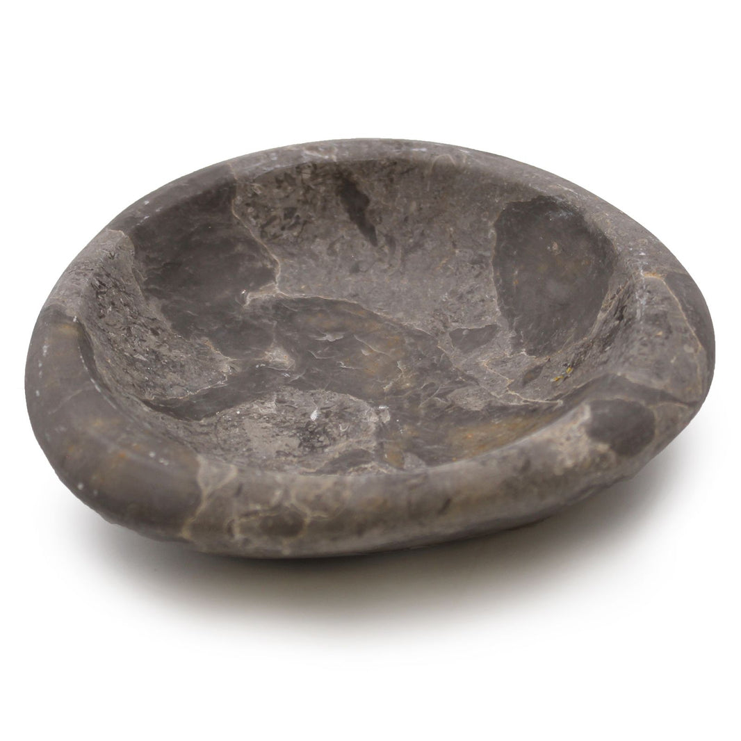 A polished grey marble dish with three distinct oval compartments, carved from a single piece of natural stone.