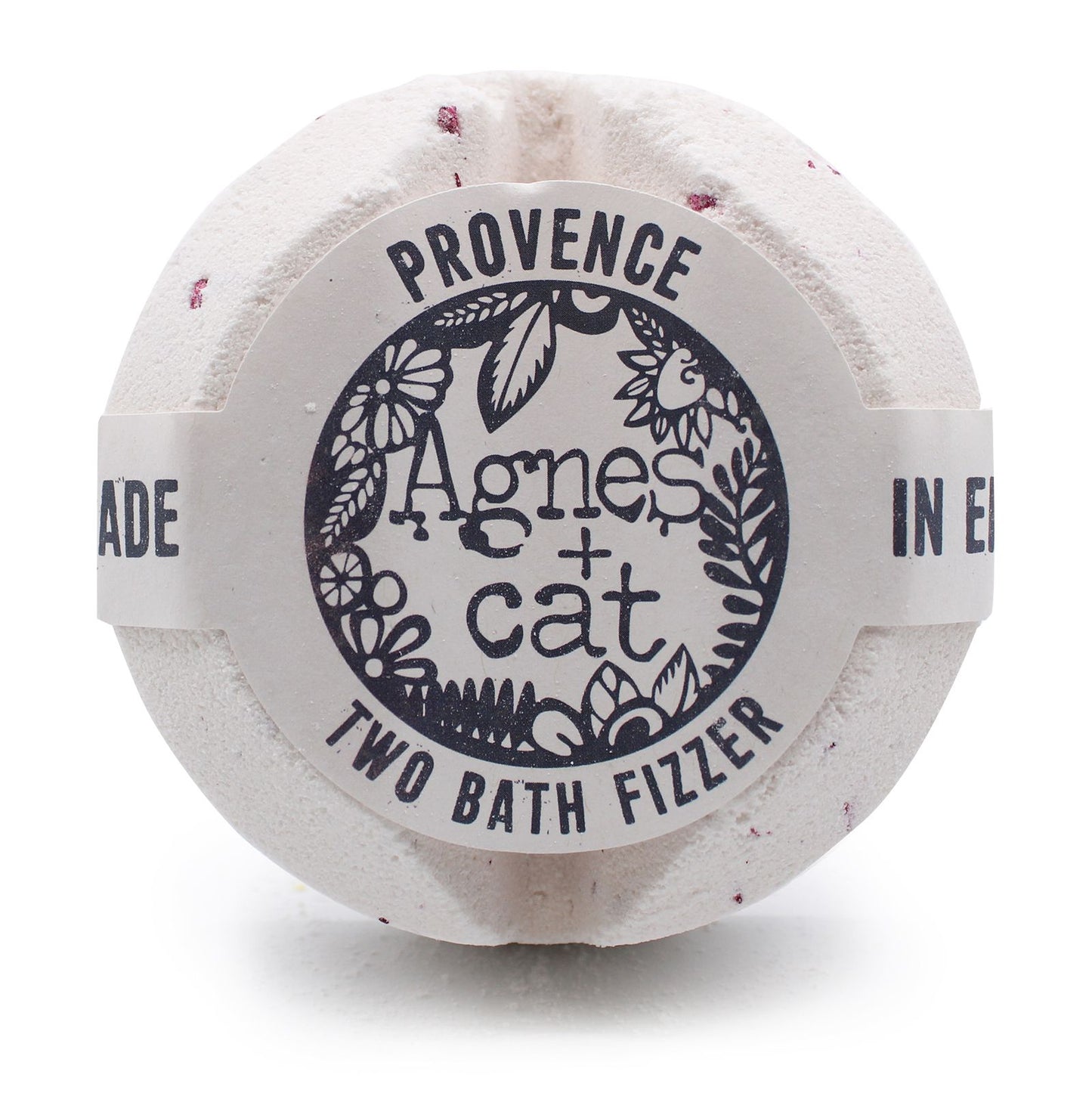 A large white bath fizzer wrapped in plastic with a grey and black label inspired by Provencal lavender.